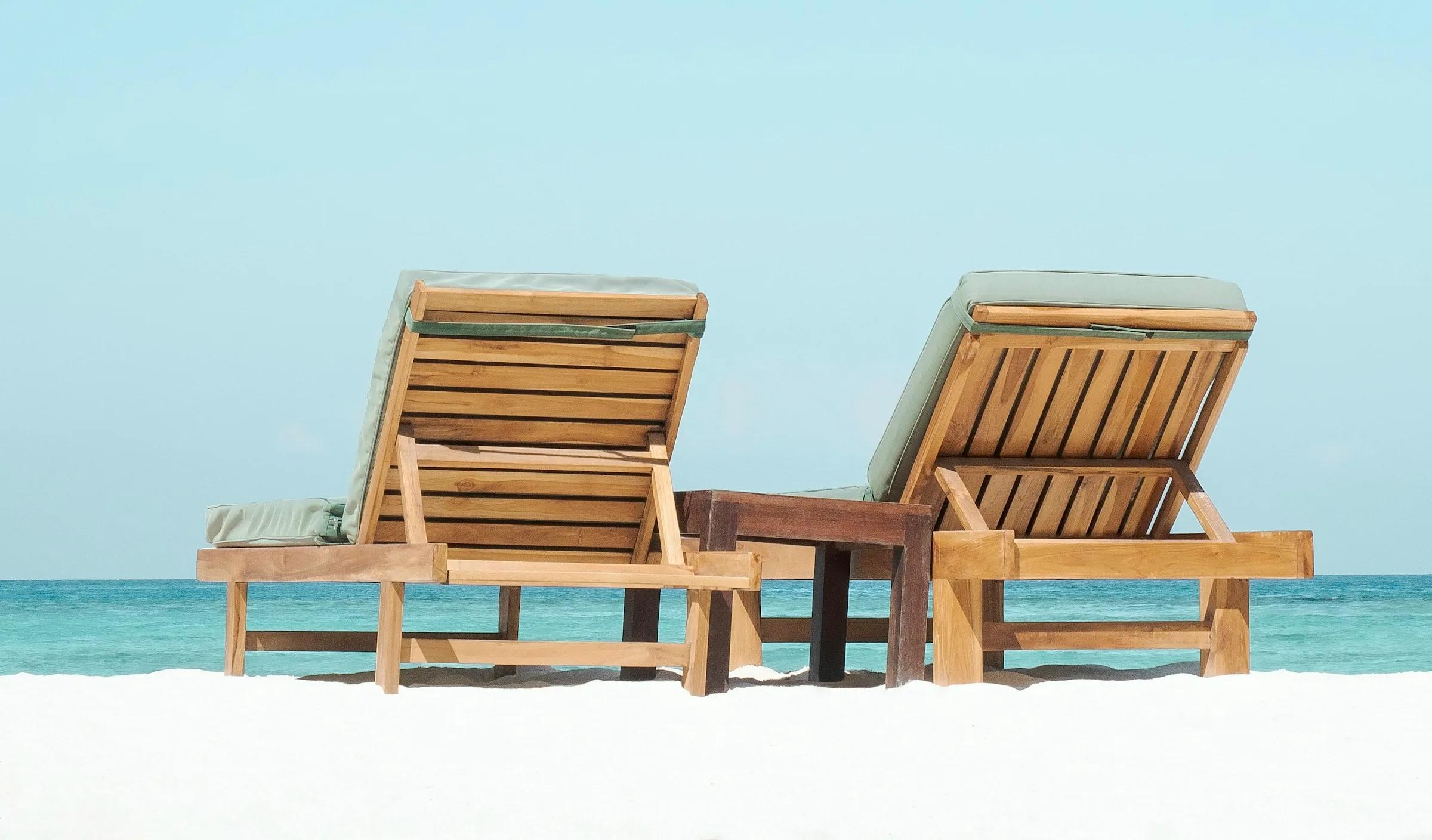 Two sun loungers on the beach facing the sea, Costa del Sol