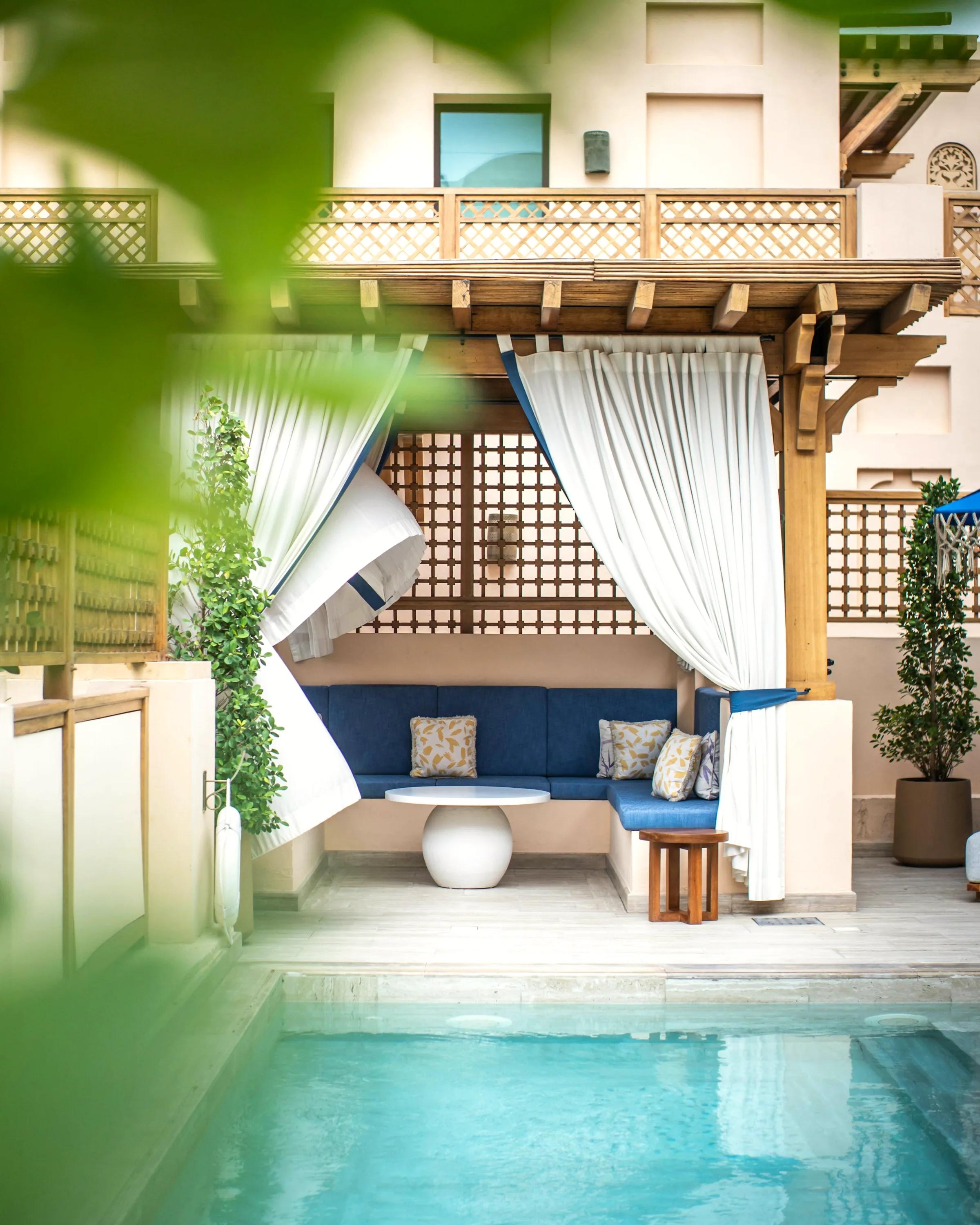 Shaded poolside seating on the Costa del Sol