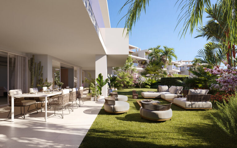 Inviting outdoor living area of a modern property, with a spacious dining set up and luxurious lounge chairs set on a manicured lawn, surrounded by lush tropical foliage, enhancing the appeal of property viewings.